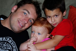 Daddy and some cuddly kids